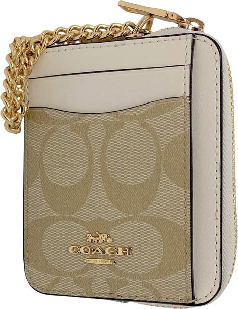 coach card wallet with zipper.